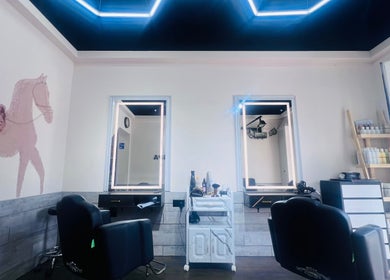 Modern salon interior at NǐĦǎo Pisces Nails Hair Beauty唐人美发 in L-imsida, MT with stylish decor and serene ambiance.