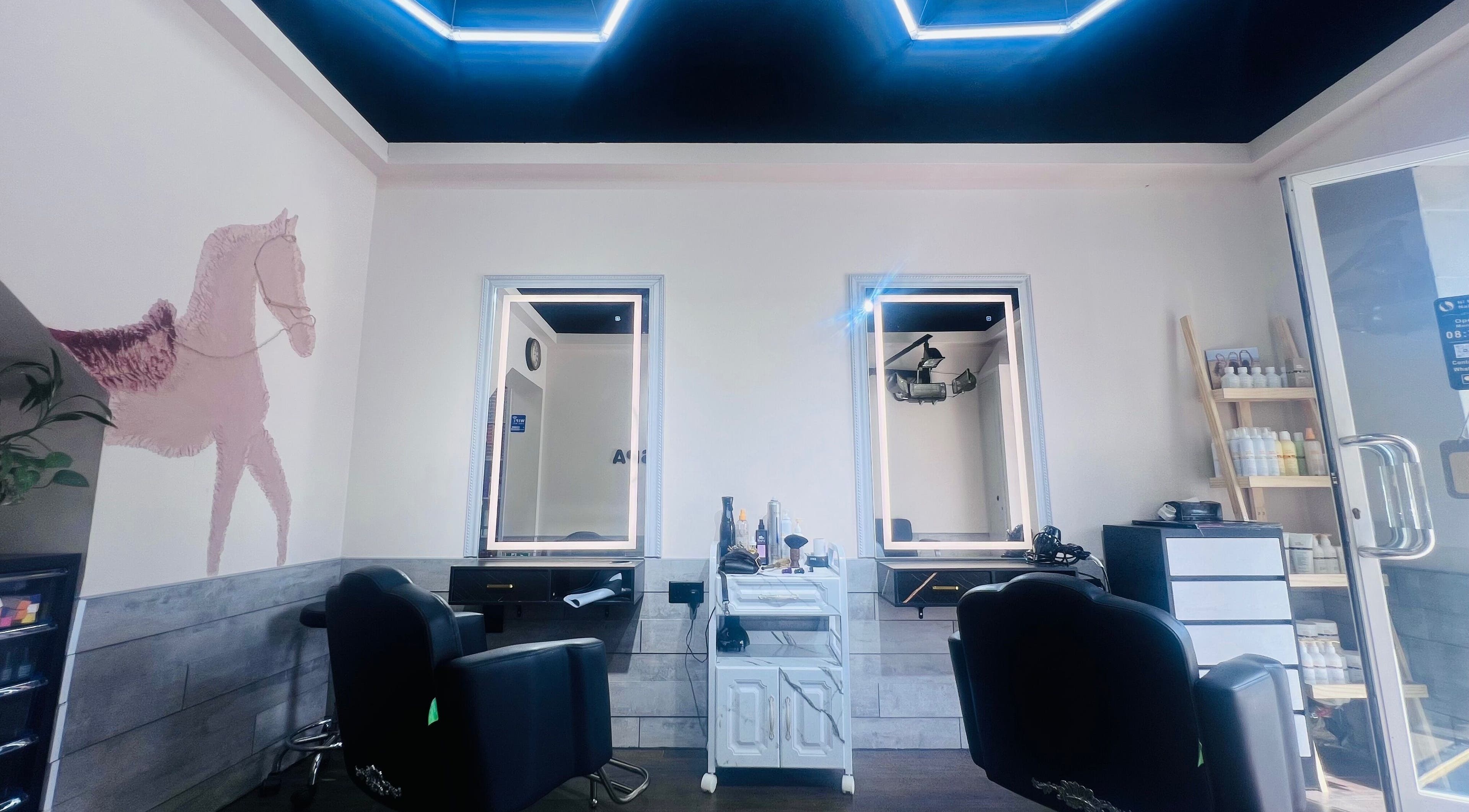 Modern salon interior at NǐĦǎo Pisces Nails Hair Beauty唐人美发 in L-imsida, MT with stylish decor and serene ambiance.