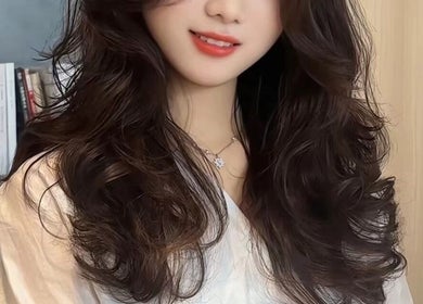 Elegant long, wavy hairstyle at NǐĦǎo Pisces Nails Hair Beauty唐人美发, L-imsida, MT.