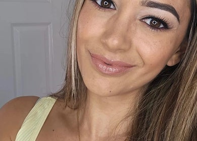 Smiling woman with makeup at Vanessa's Makeup LTD at Botanica, Datchet, England, GB.