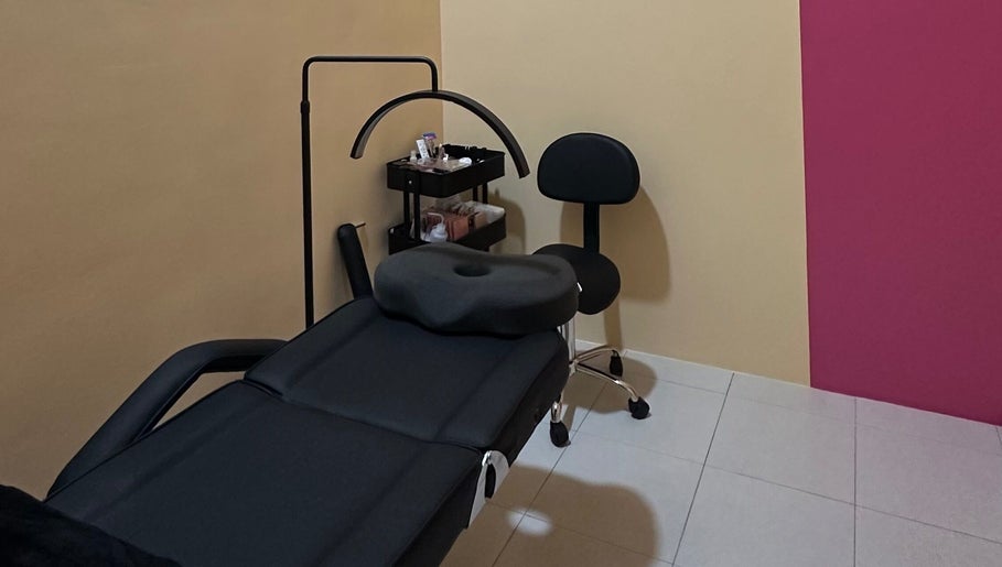Serene treatment room at Bout That Beauty in Kuantan, Pahang, MY, featuring a comfortable massage table.
