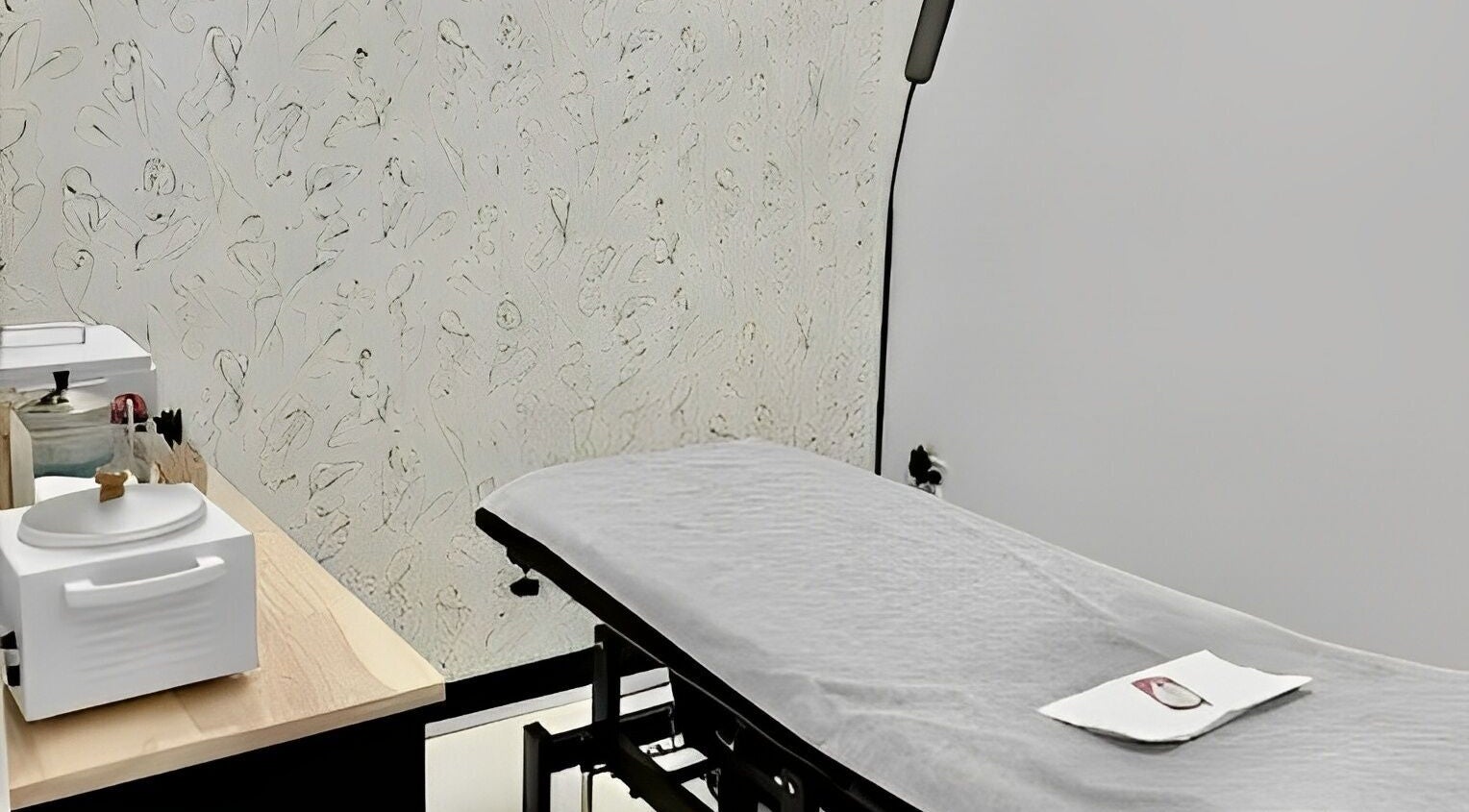Relaxing treatment room at Waxology Waxing Studio, Jacksonville, Florida, US. Modern decor and equipment.