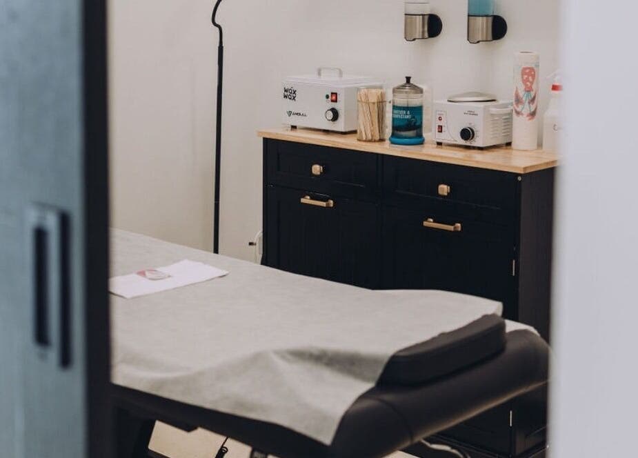 Comfortable waxing room at Waxology Waxing Studio, Jacksonville, Florida, US, showcasing professional equipment.