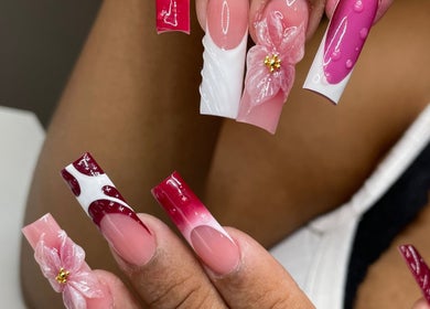Stylish nail design at Prettify Me Beauty Lounge in Willemstad, Curaçao, CW showcasing intricate flower details.