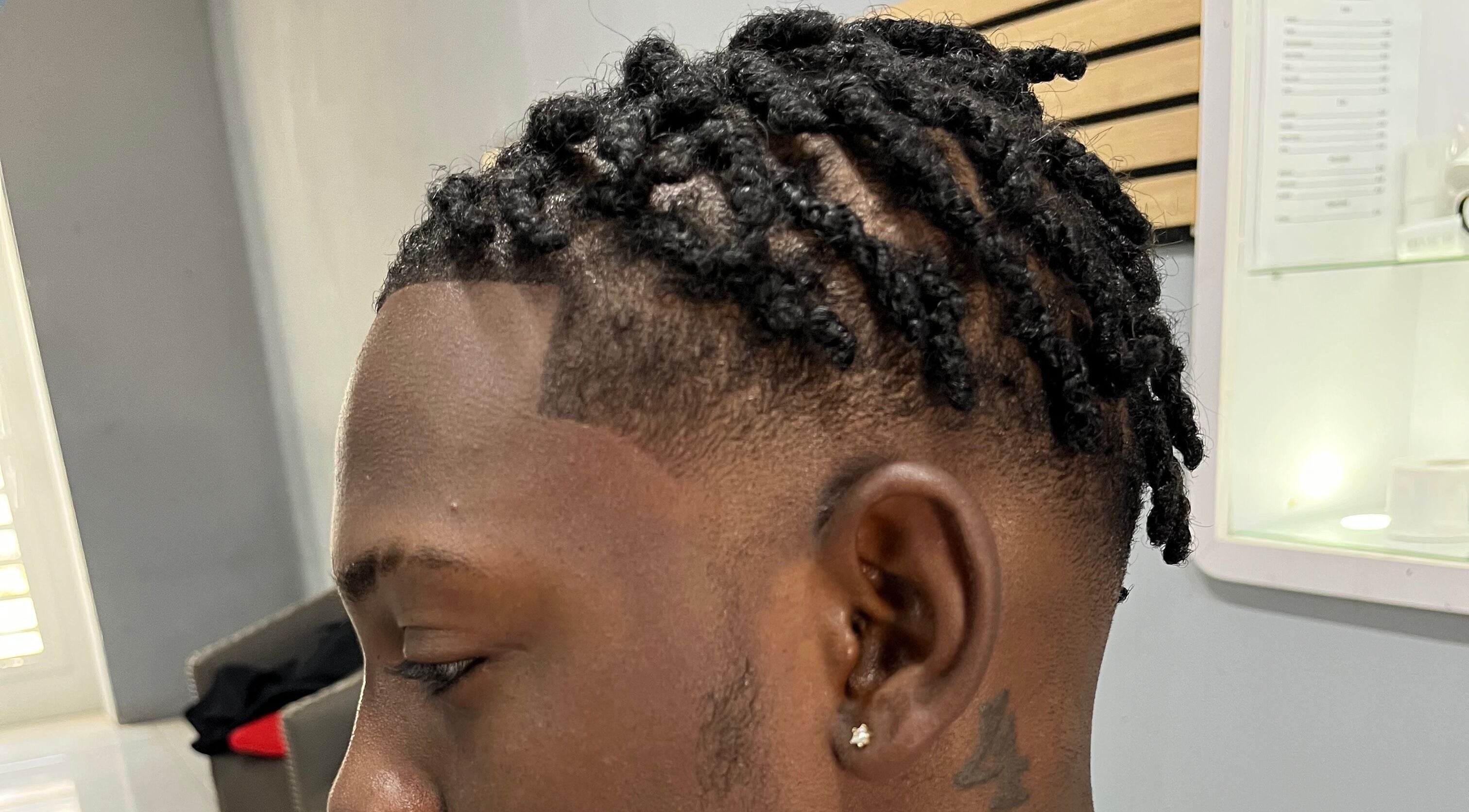 Closeup of intricate twist hairstyle at Royal Fades in Kralendijk, Bonaire, BQ.