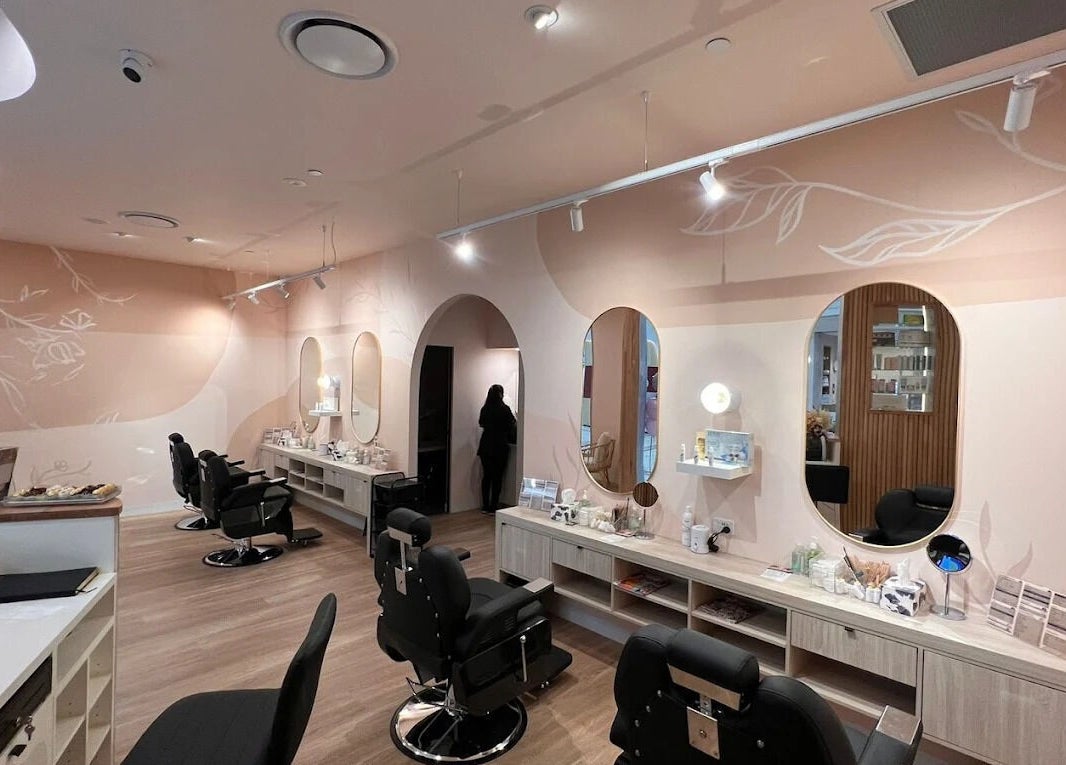 Chic interior of Savoy Beauty - Innaloo, featuring modern styling stations in pastel decor, Innaloo, Western Australia, AU.