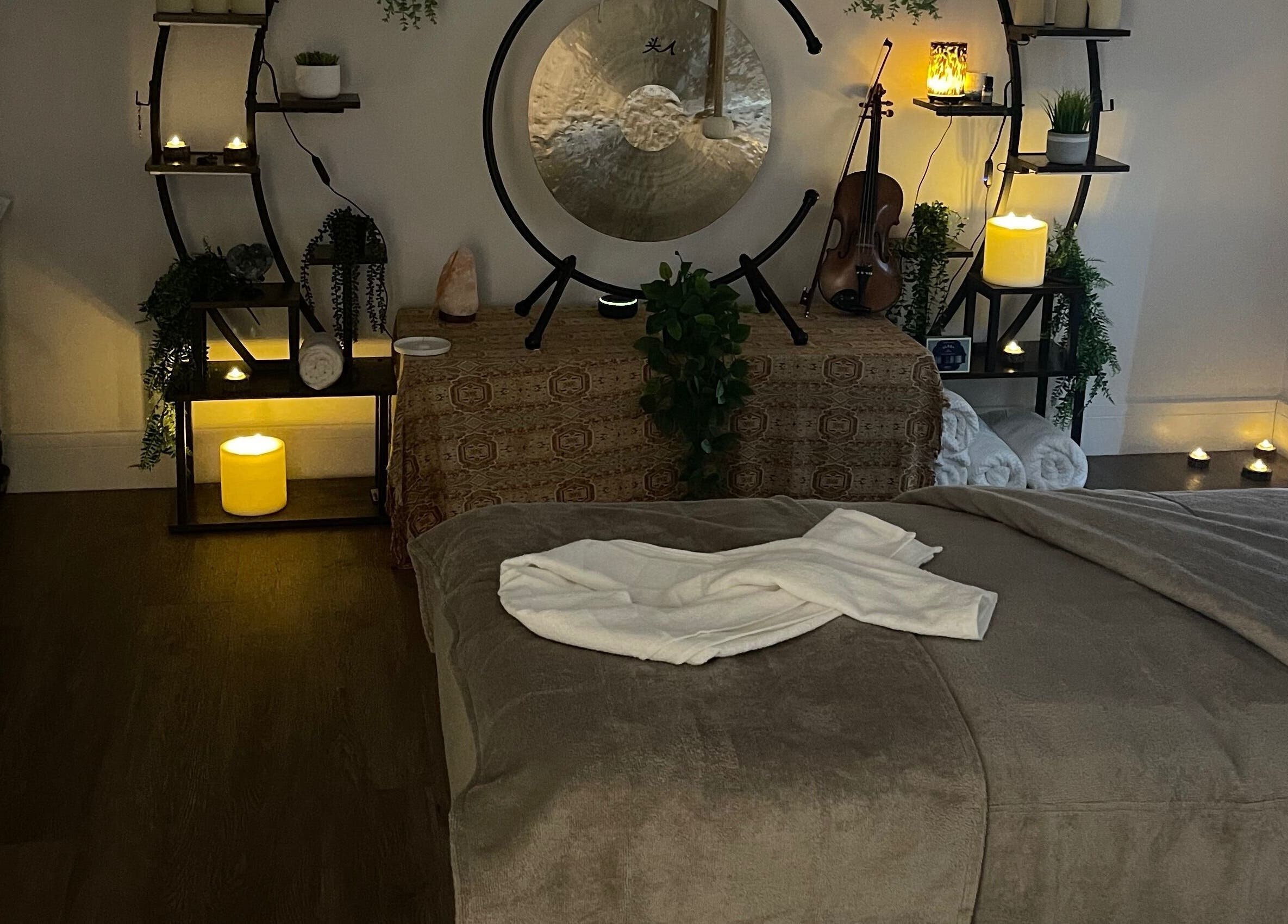 Relaxing treatment room at Varches Skin & Body Studio, Meopham, England, GB, with candles and soothing decor.
