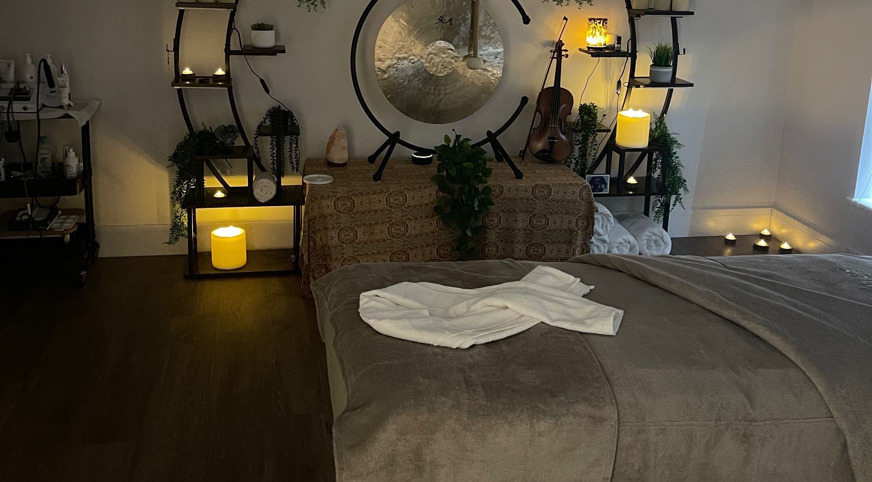 Relaxing treatment room at Varches Skin & Body Studio, Meopham, England, GB, with candles and soothing decor.