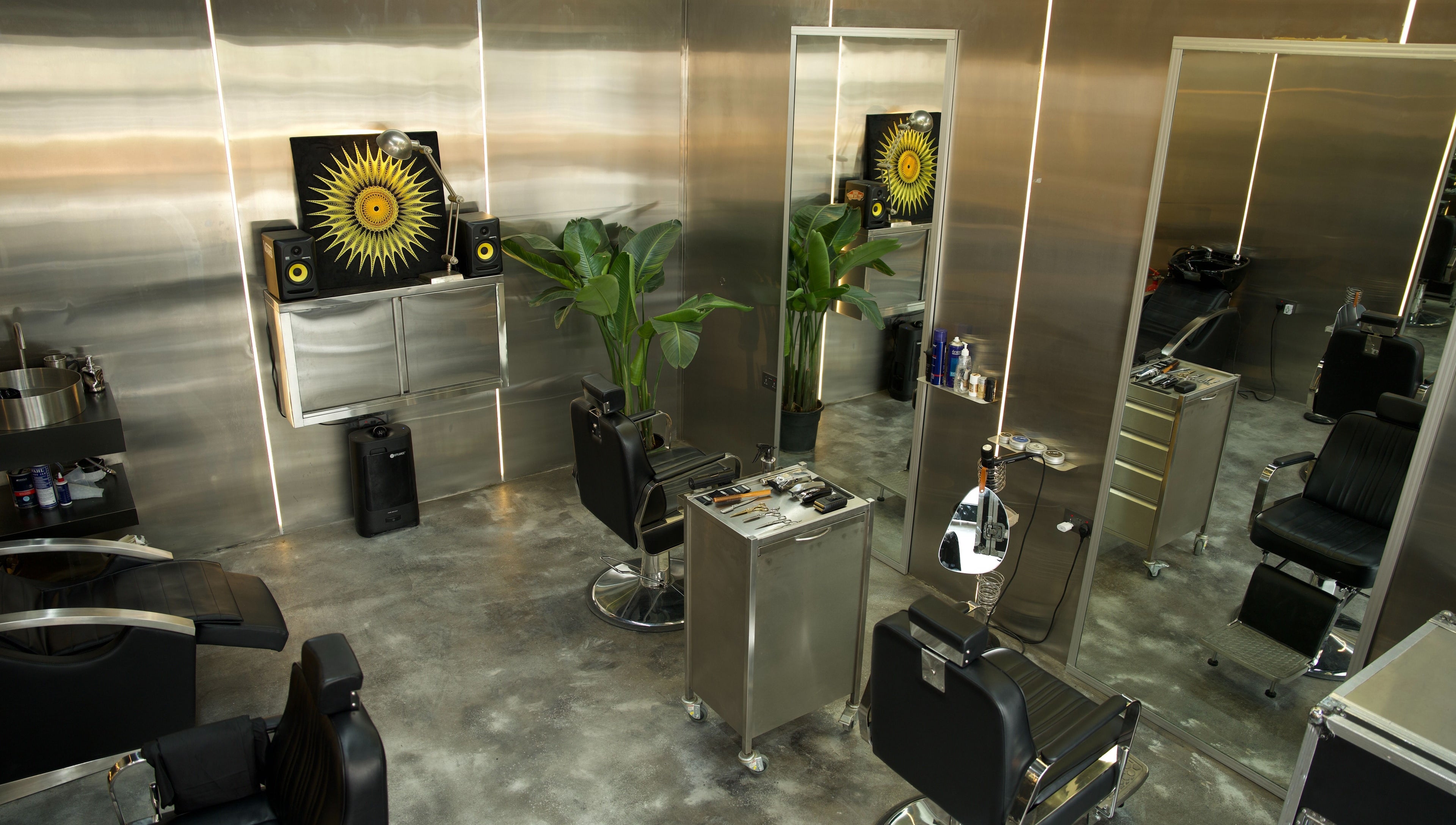 Modern interior of Dialan Gents Salon L.L.C in Dubai, AE. Stylish barber chairs and sleek decor.