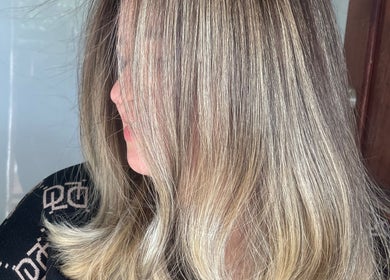Blonde highlights by Colour by Margarita, Primbee, New South Wales, AU showcase a sleek hair style.