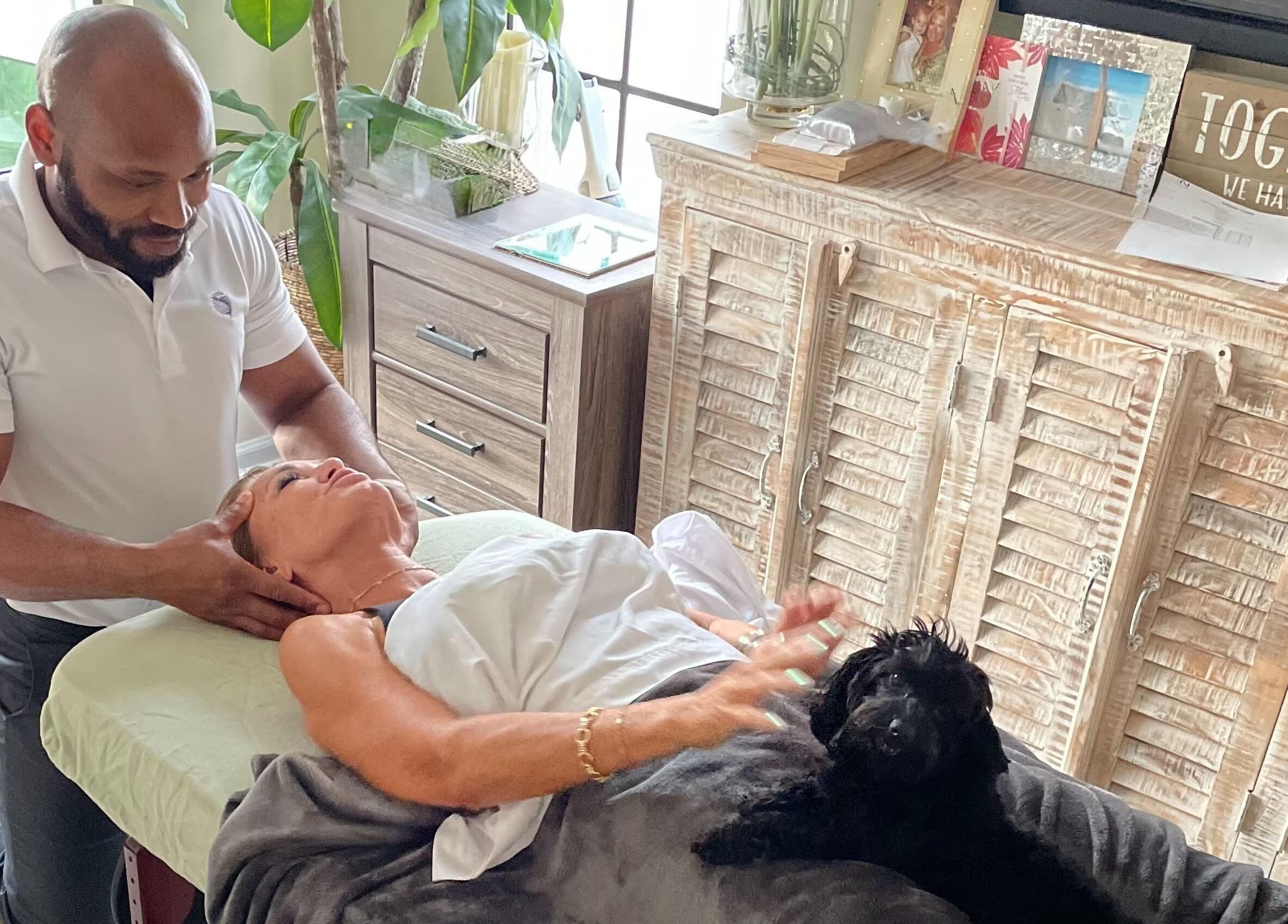 Relaxing therapy session at Unifyed Therapy in Stuart, Florida, US, featuring a tranquil setting with client.