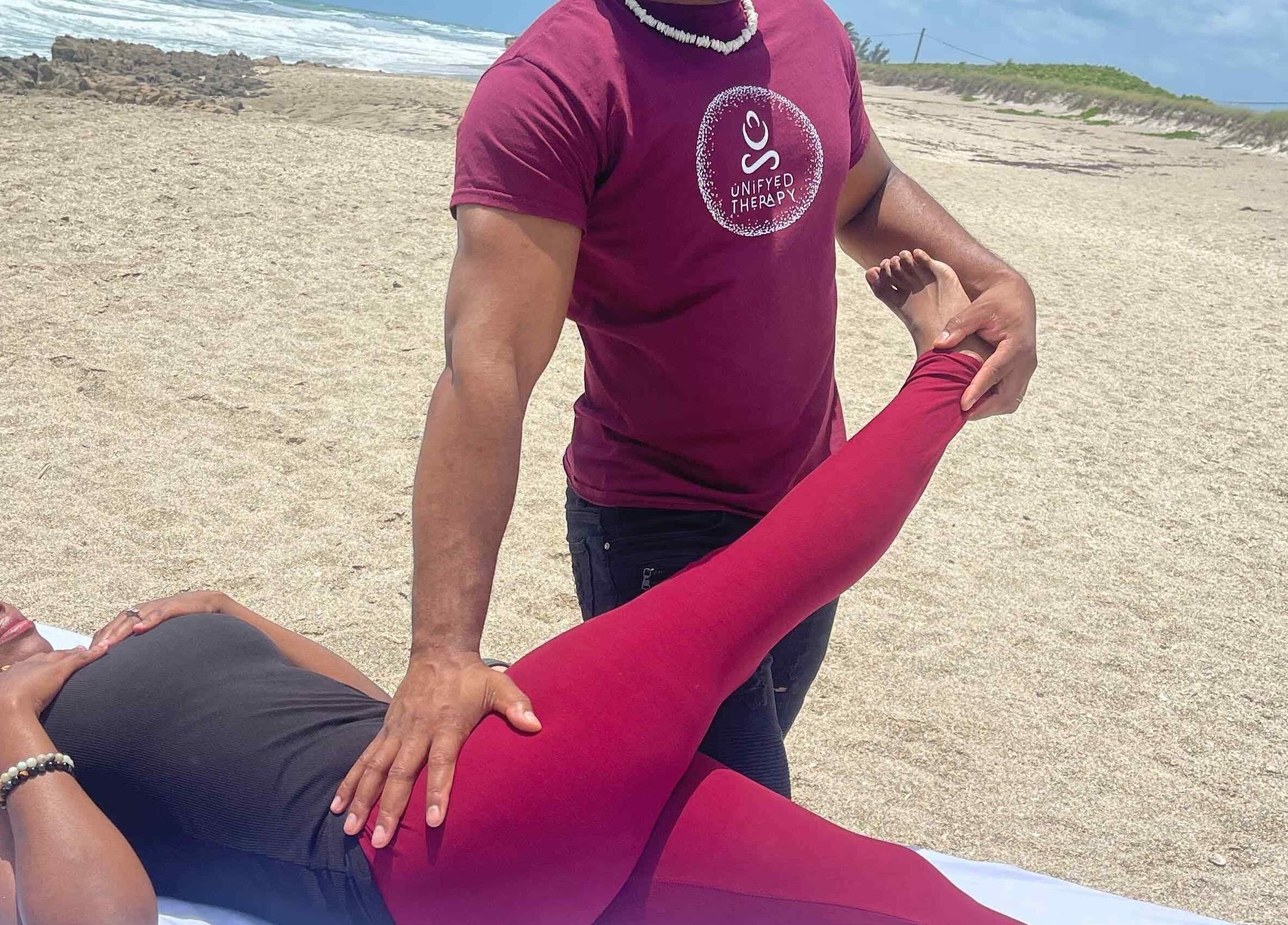 Unifyed Therapy session on a sandy beach in Stuart, Florida, US, promoting holistic wellness and relaxation.