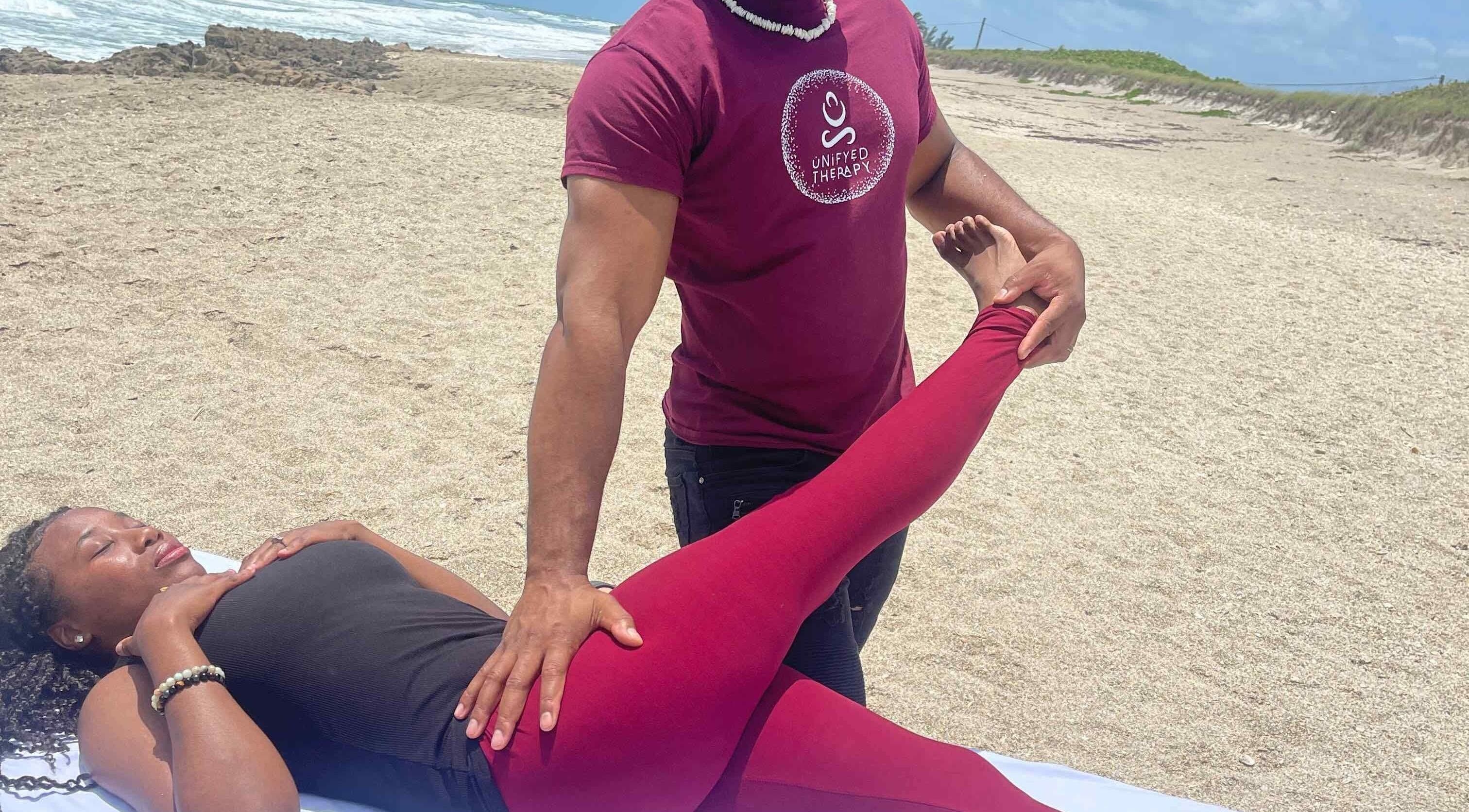 Unifyed Therapy session on a sandy beach in Stuart, Florida, US, promoting holistic wellness and relaxation.