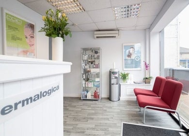 Reception area of Addlestone Therapy in Addlestone, England, GB with modern decor and welcoming seating.