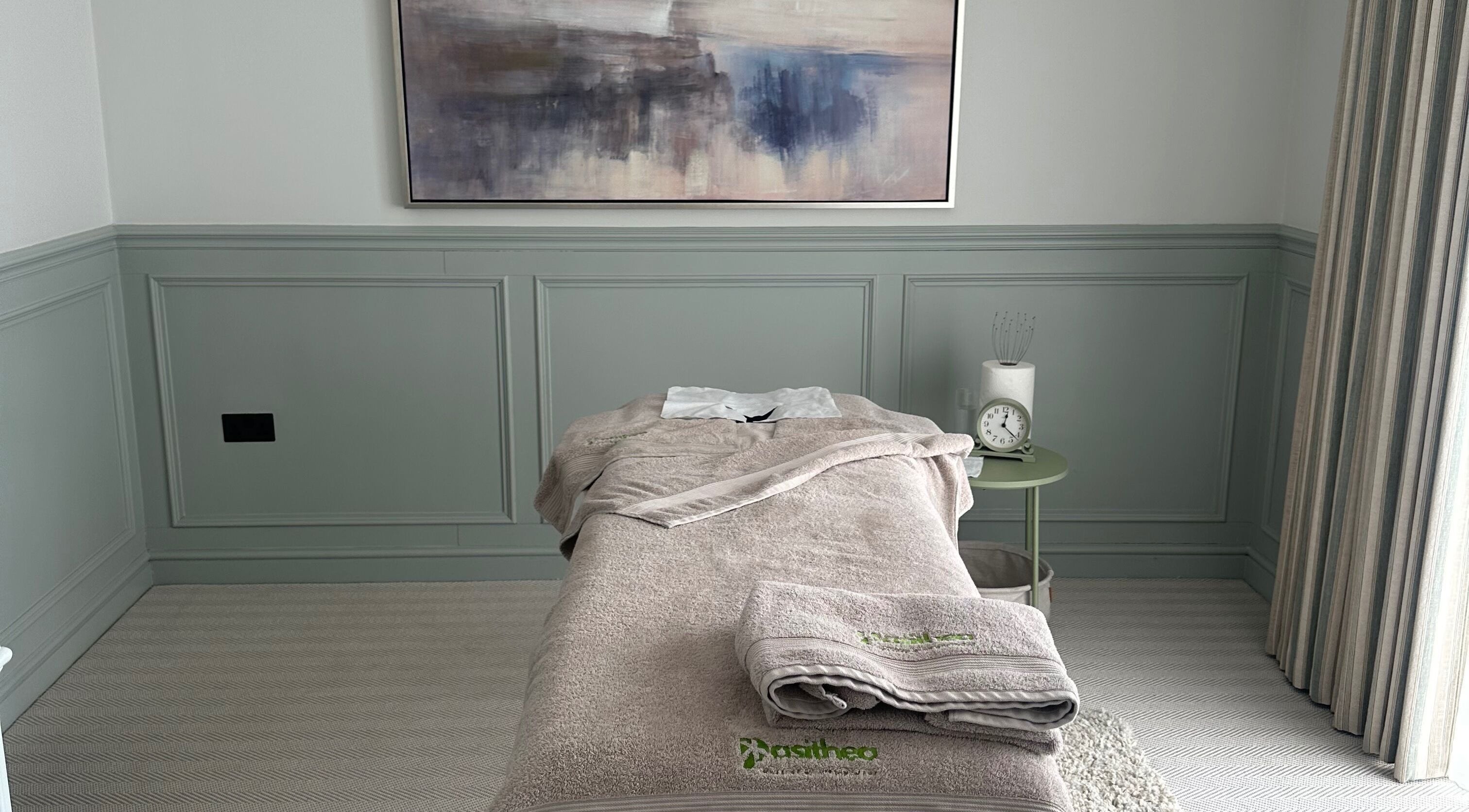 Relaxing massage table at Pasithea Massage by Appointment, Ventnor, England, GB, with soft lighting and calming decor.