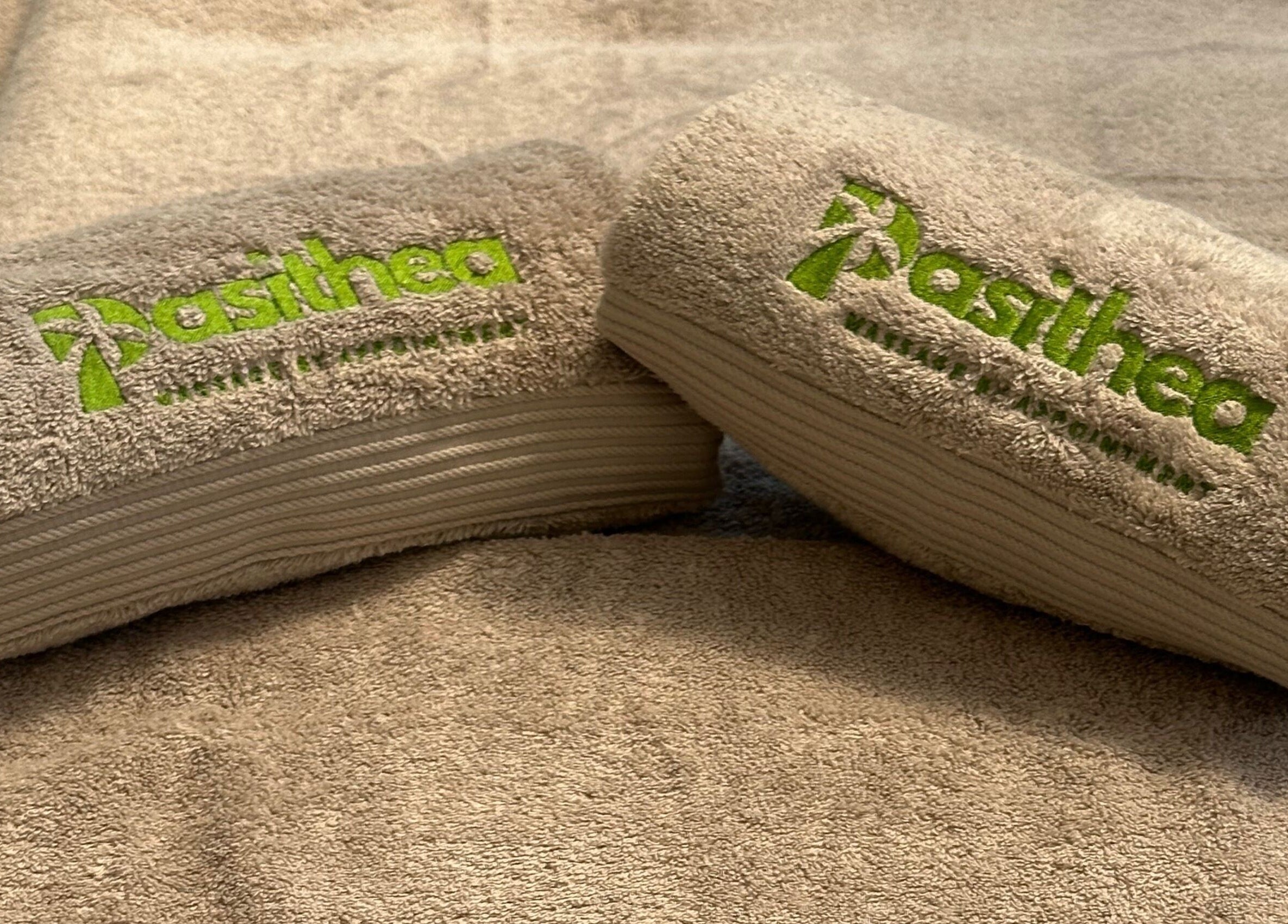 Pasithea Massage by Appointment towels in Ventnor, England, GB, showcasing soft beige textures.