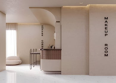 Elegant interior at Glow House Salon, الجهراء, الجهراء, KW, featuring a coffee station and seating.