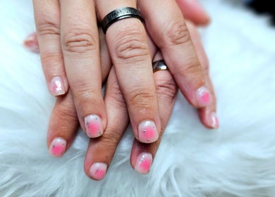 Stylish pink nail art from Dark Envy Nails in Swaffham, England, GB, showcasing unique design and elegance.