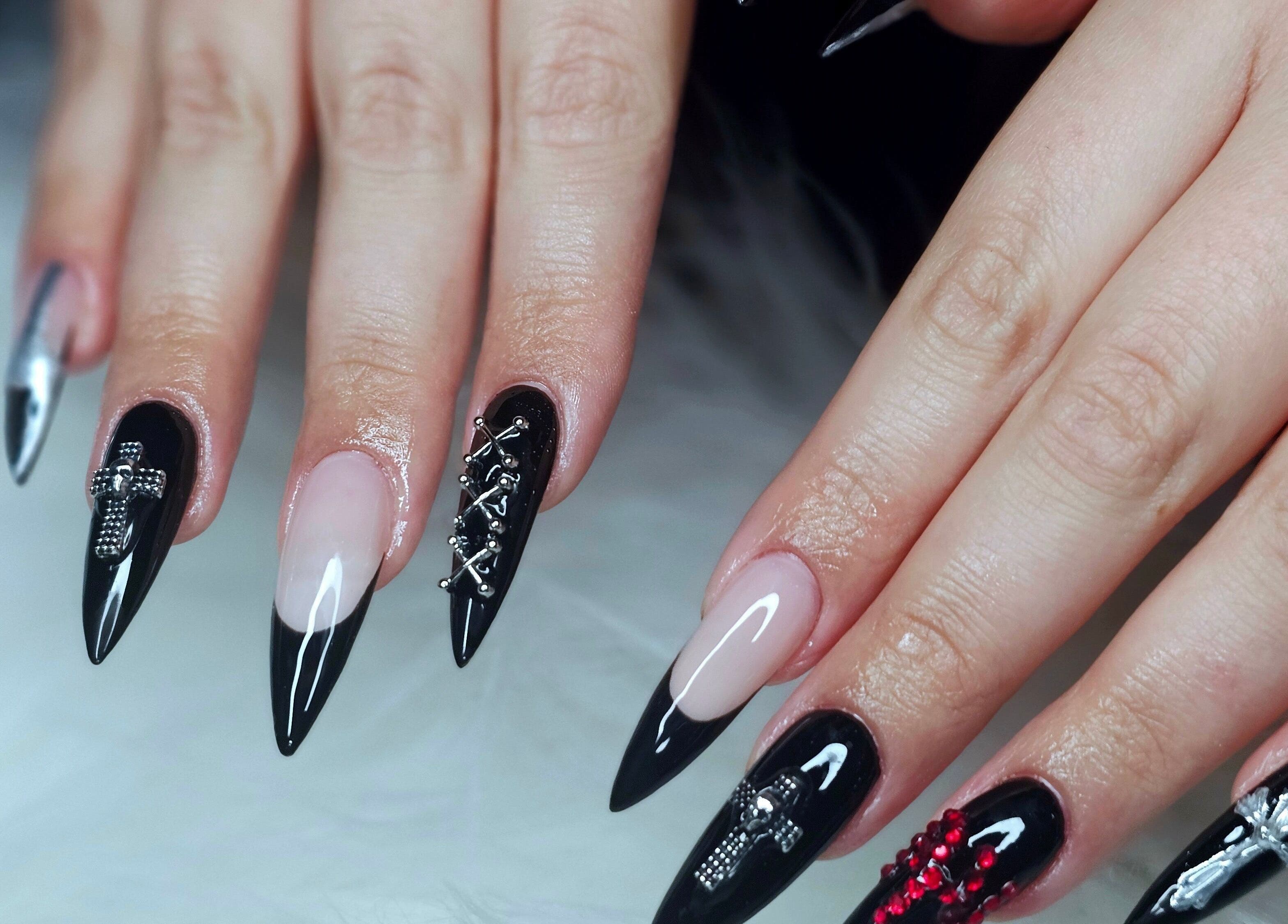 Stylish gothic nail art at Dark Envy Nails, Swaffham, England, GB showcasing intricate metallic designs.