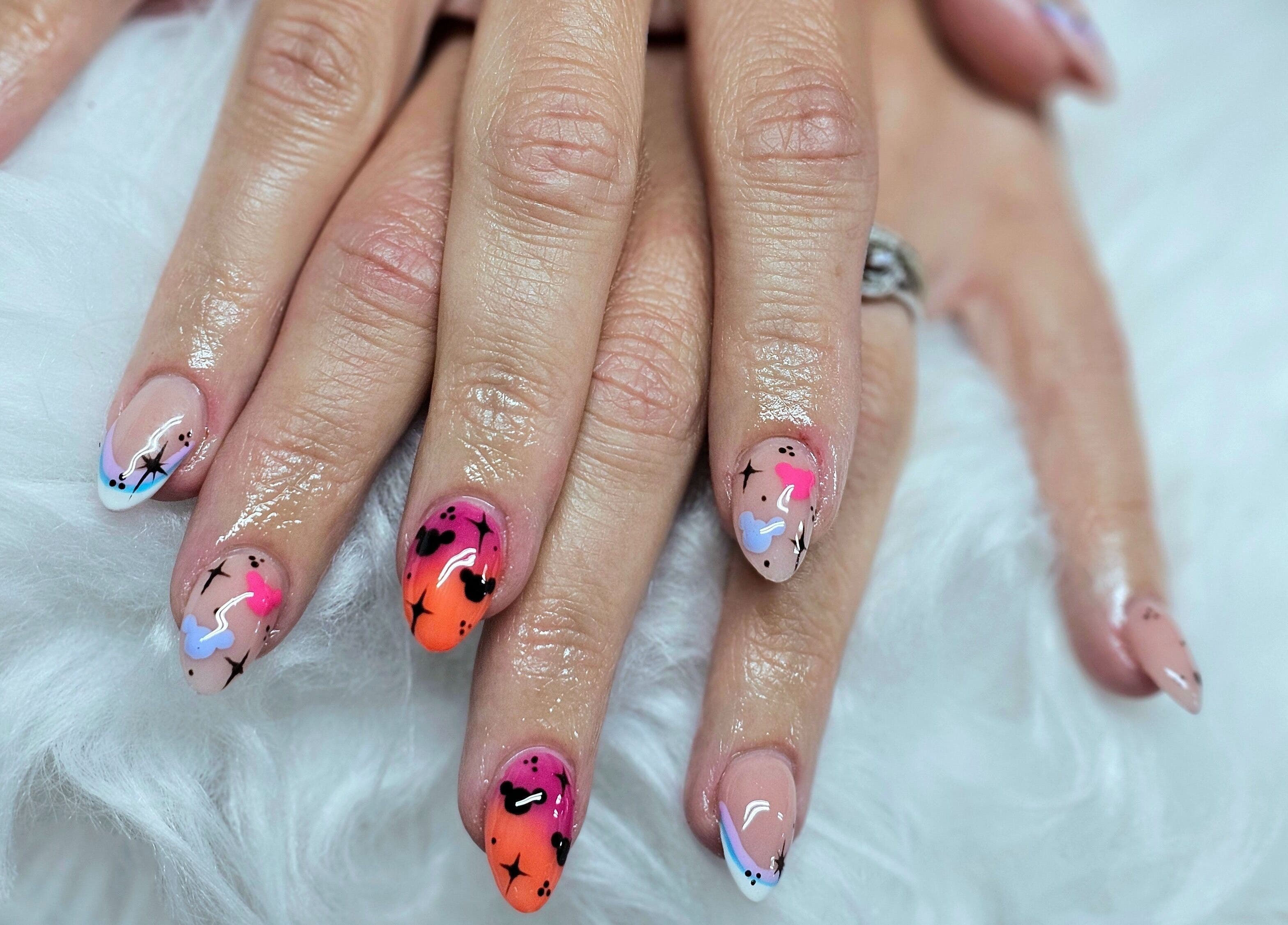 Artistic nail designs at Dark Envy Nails, Swaffham, England, GB showcasing a modern, colorful style.