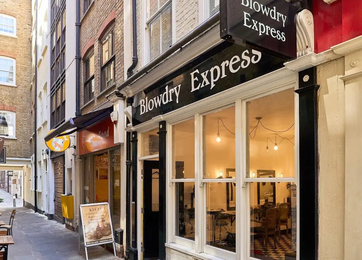 Charming exterior of Blow Dry Express - Monument in London, United Kingdom, GB, showcasing its stylish entrance.
