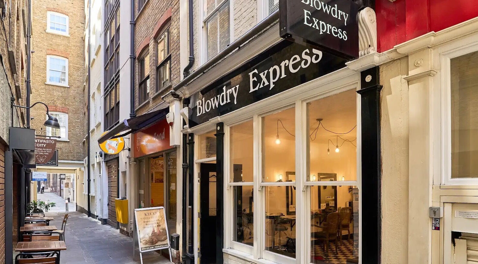 Charming exterior of Blow Dry Express - Monument in London, United Kingdom, GB, showcasing its stylish entrance.