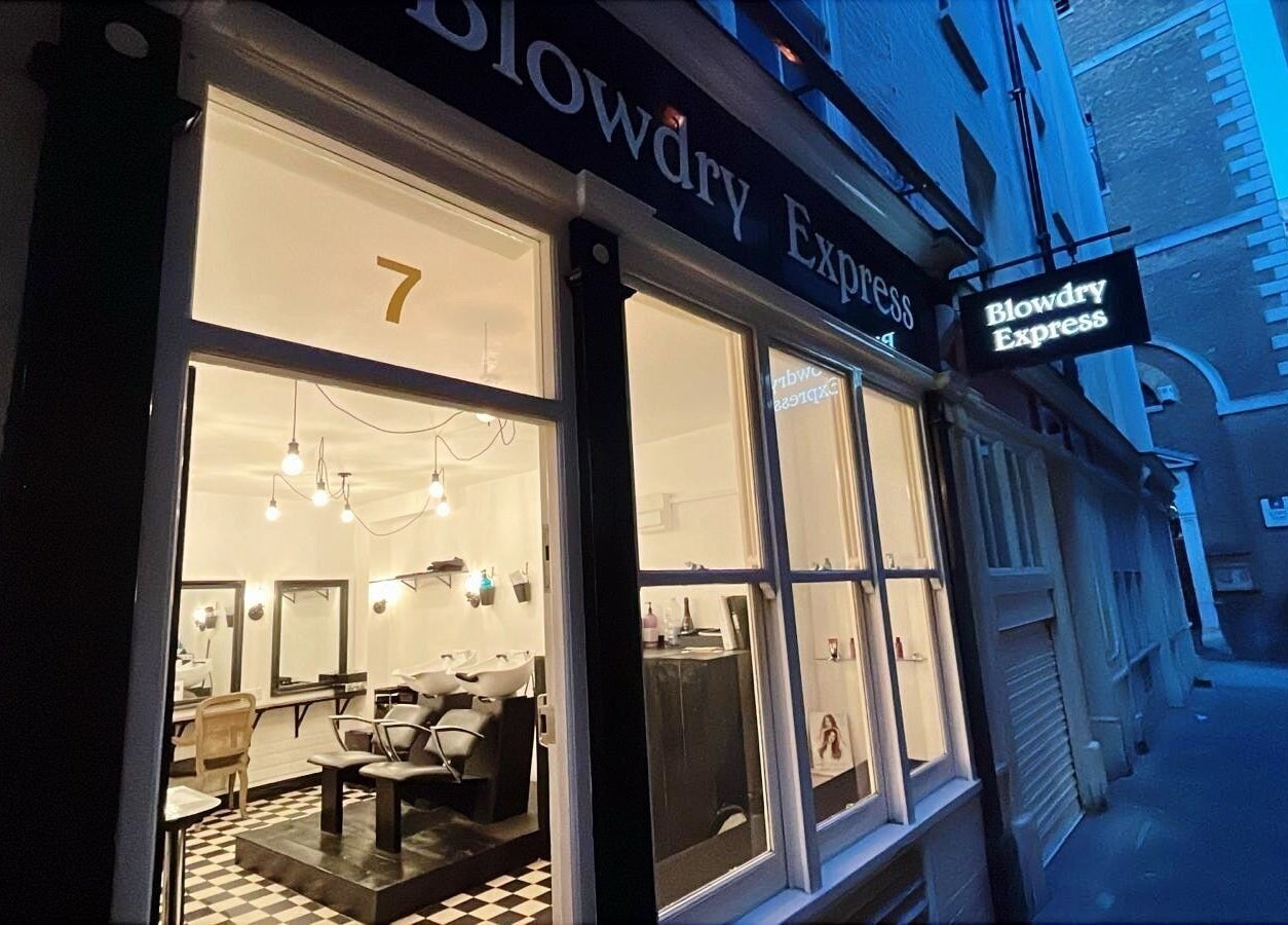 Street view of Blow Dry Express - Monument in London, United Kingdom, GB, showcasing its well-lit modern interior.