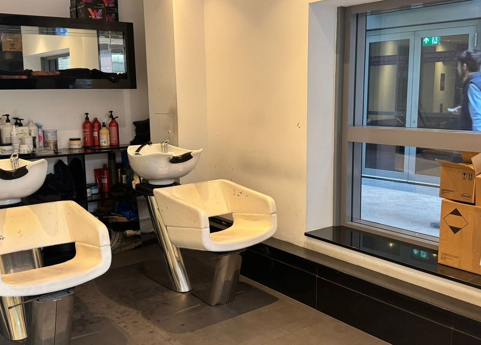 Modern hair washing stations at Blow Dry Express - St Pauls, London, United Kingdom, GB.