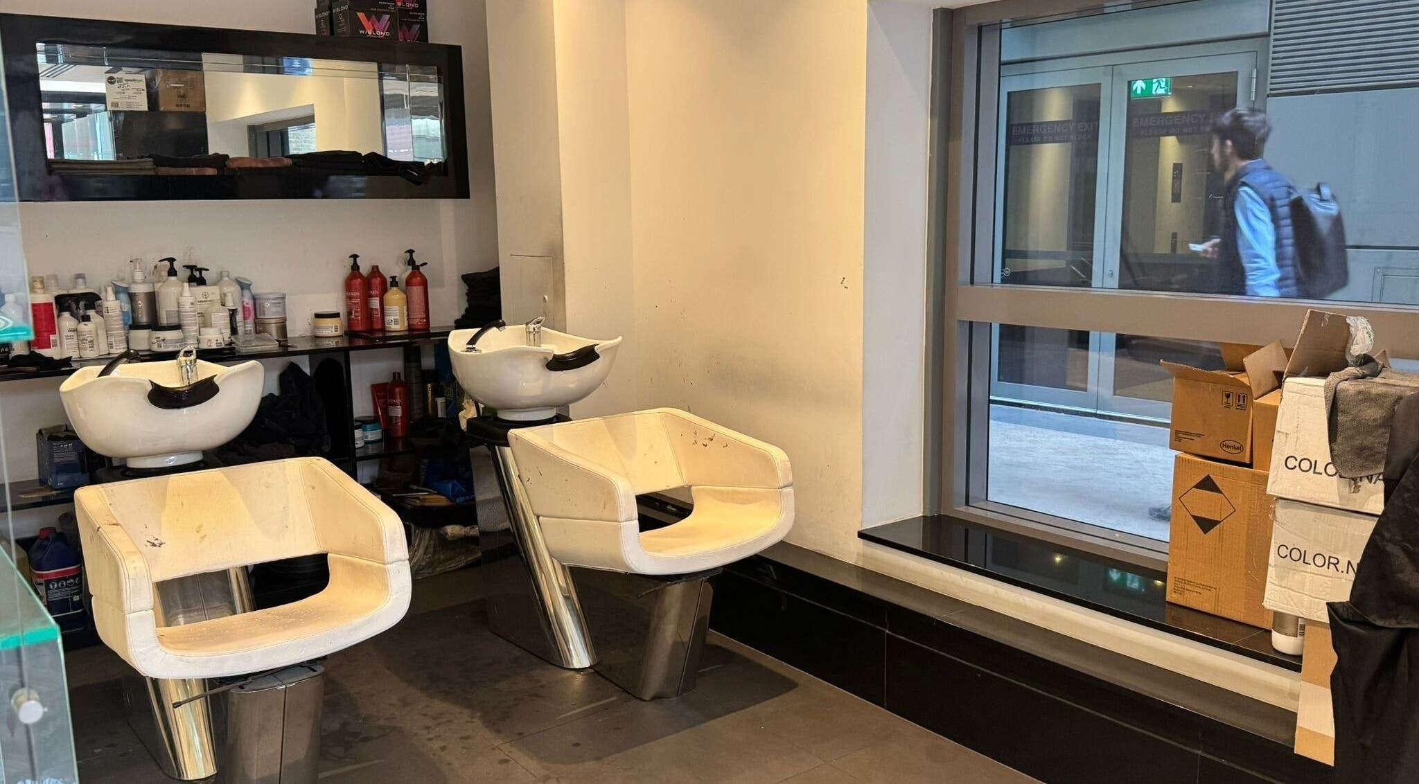 Modern hair washing stations at Blow Dry Express - St Pauls, London, United Kingdom, GB.