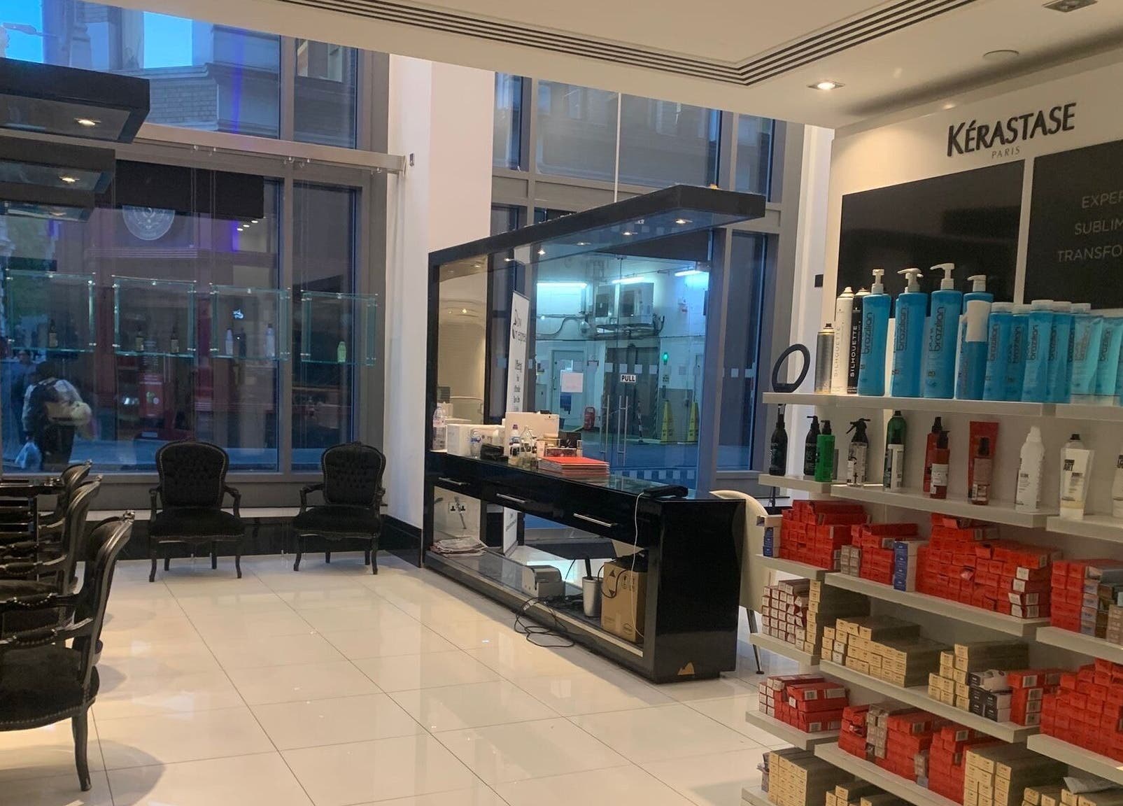 Modern salon interior at Blow Dry Express - St Pauls, London, United Kingdom, GB showcasing sleek design and products.