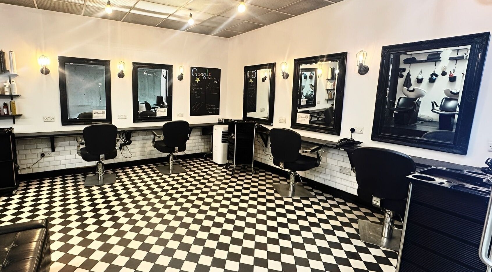 Modern salon interior at Blow Dry Express - Canary Wharf Tube Station in London, United Kingdom, GB.