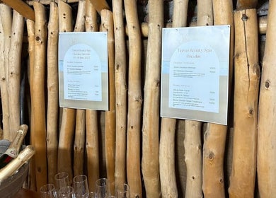Tiara's Beauty Spa menu on wooden wall, Cape Town, Western Cape, ZA.