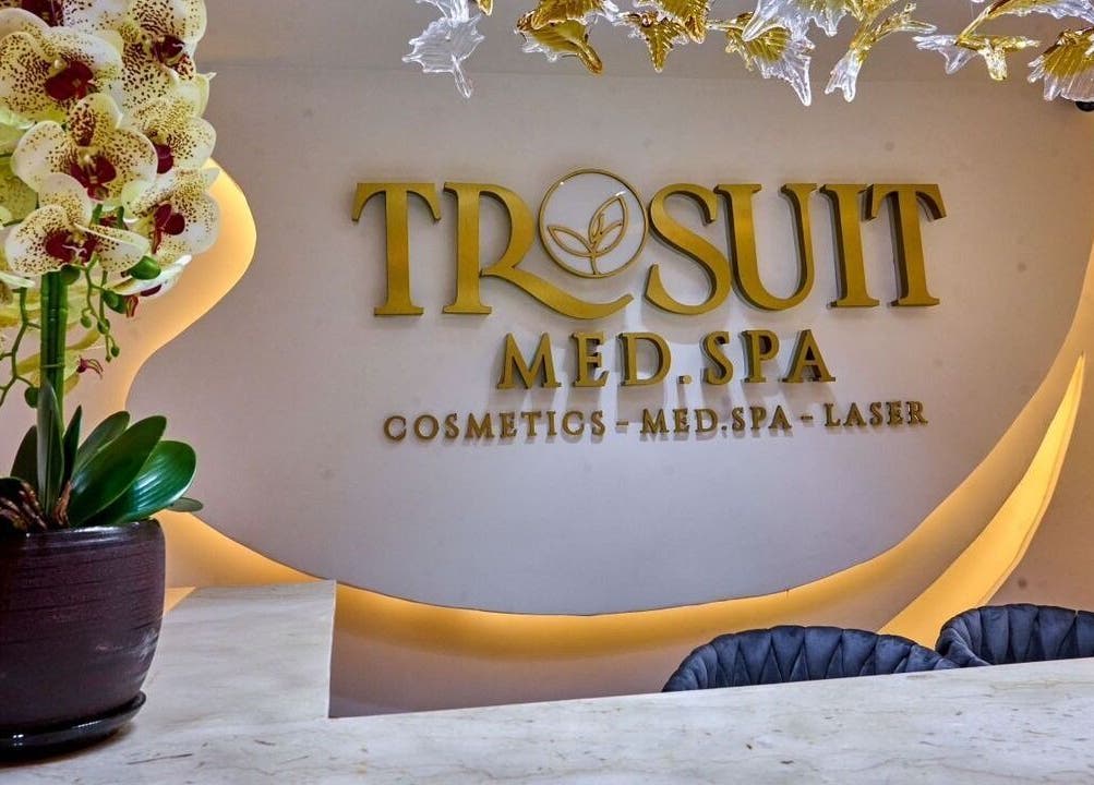 Trosuitmedspa reception with floral decor in Ikeja, Lagos, NG highlighting luxury and tranquility.