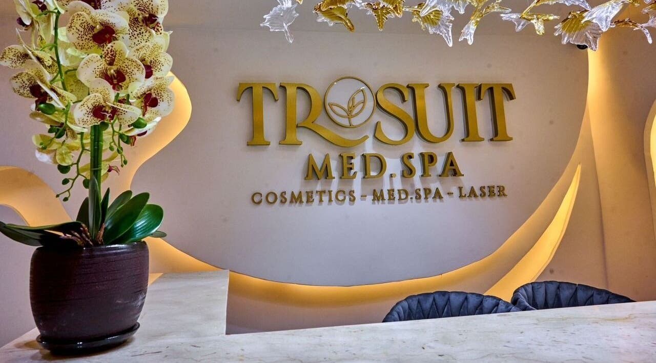 Trosuitmedspa reception with floral decor in Ikeja, Lagos, NG highlighting luxury and tranquility.