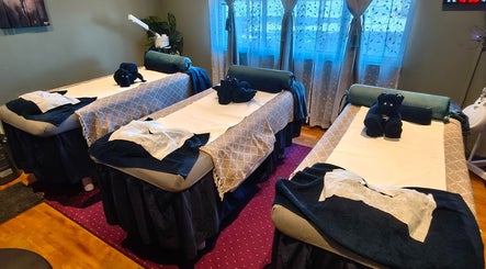 Relaxing massage tables at The Masked Spa Mobile in ZA offer a tranquil spa experience.
