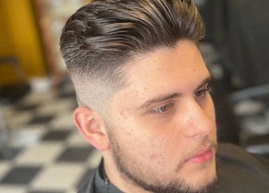 Trendy men's haircut at Loveday's Barber Shop, Sheffield, England, GB.