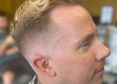 Close-up of a fresh haircut at Loveday's Barber Shop, Sheffield, England, GB showcasing expert styling.