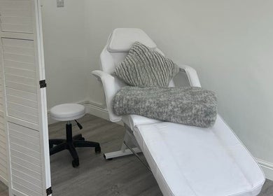 Relaxing treatment chair at Elegance Permanent Makeup, Nottingham, England, GB, highlighting comfort and style.