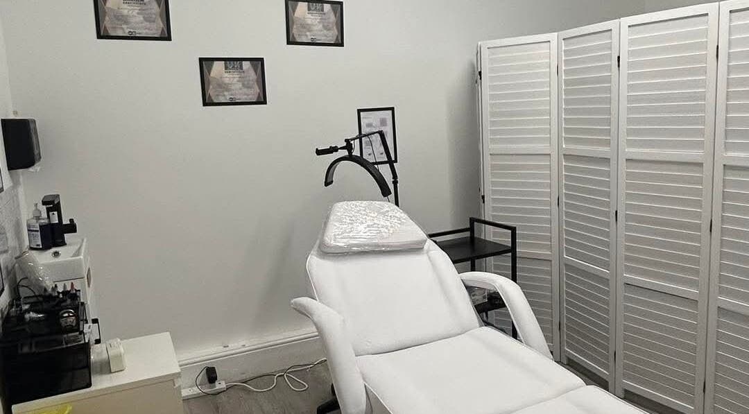 Elegance Permanent Makeup treatment room in Nottingham, England, GB featuring a white treatment chair.