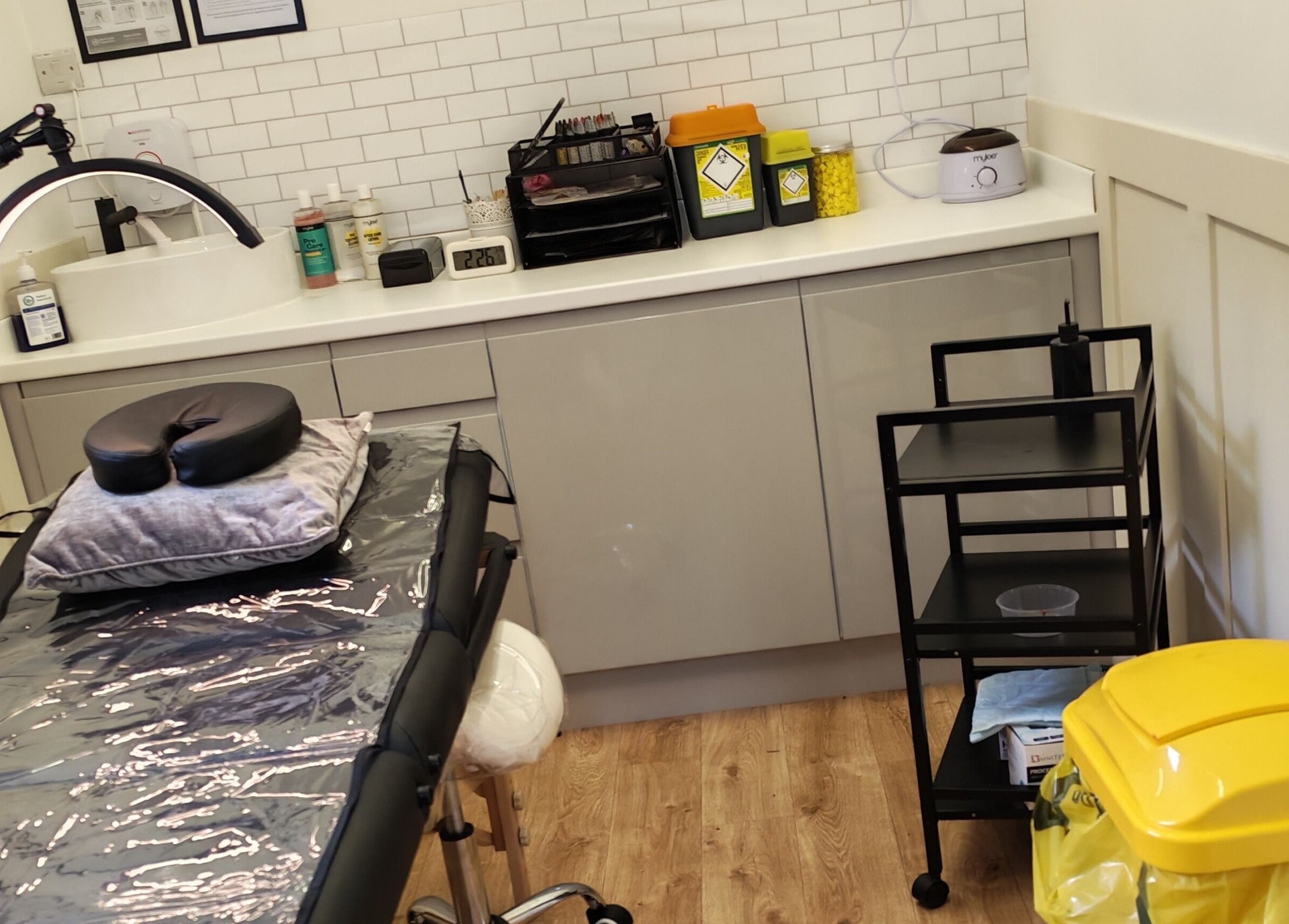 Elegance Permanent Makeup studio in Kirkby In Ashfield, England, showing a treatment table and equipment.