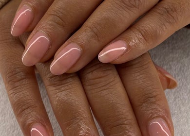 Manicured nails at AmiRoseBeauté, Barrington, England, GB. Polished and elegant look.