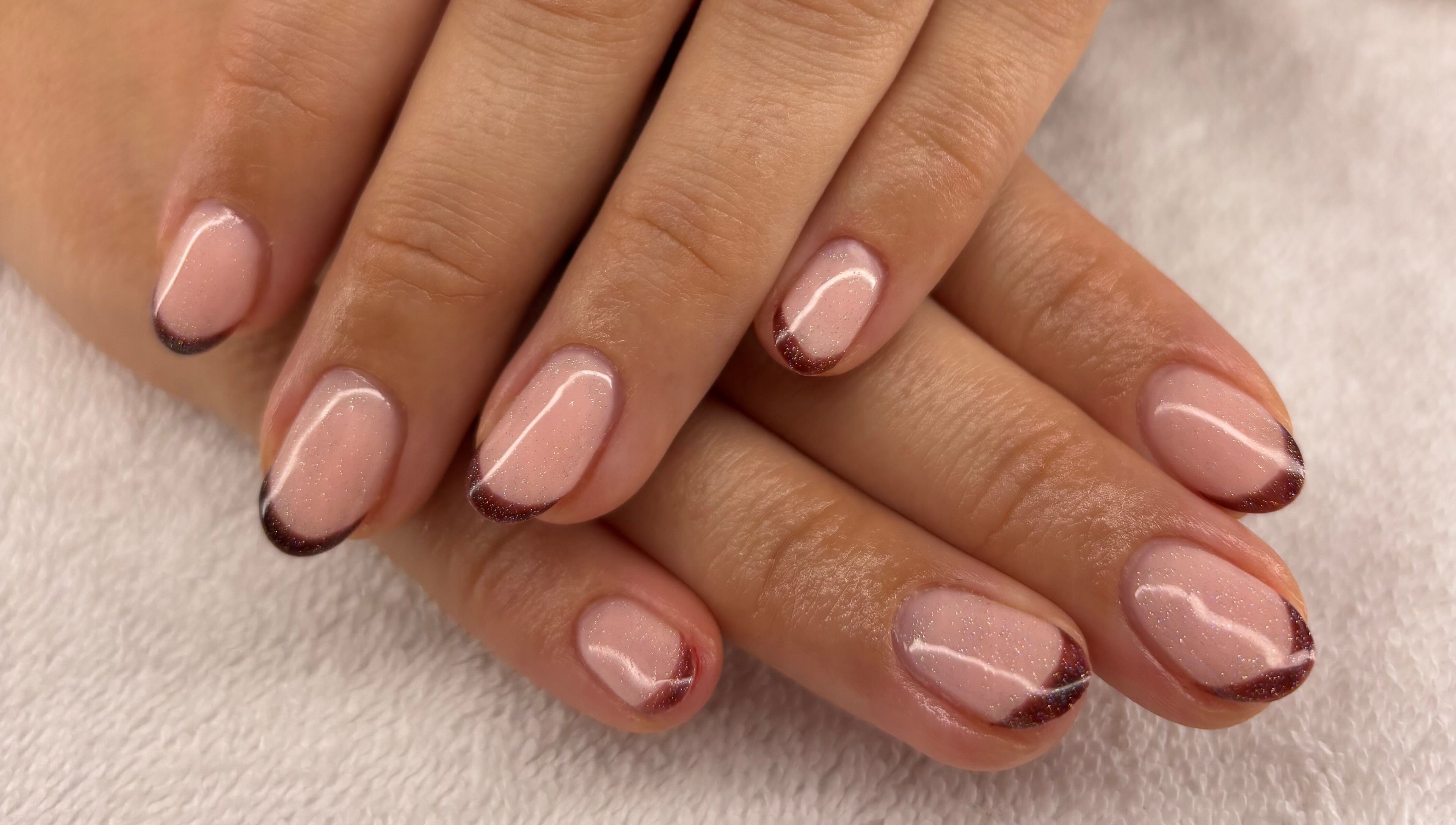 Elegant manicured nails with a glossy finish at AmiRoseBeauté, Barrington, England, GB.