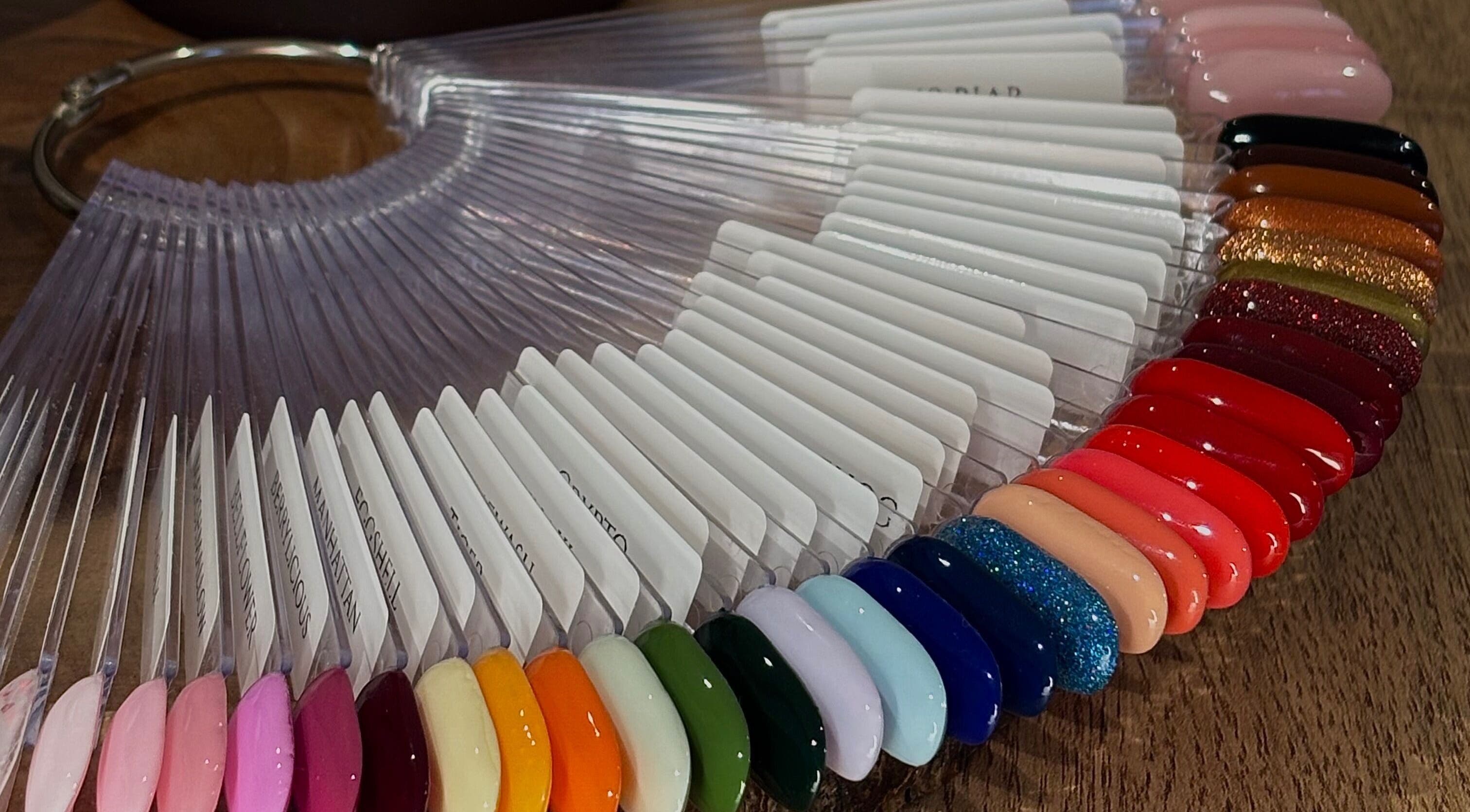 Colorful nail polish swatches at AmiRoseBeauté in Barrington, England, GB, showcasing vibrant manicure options.