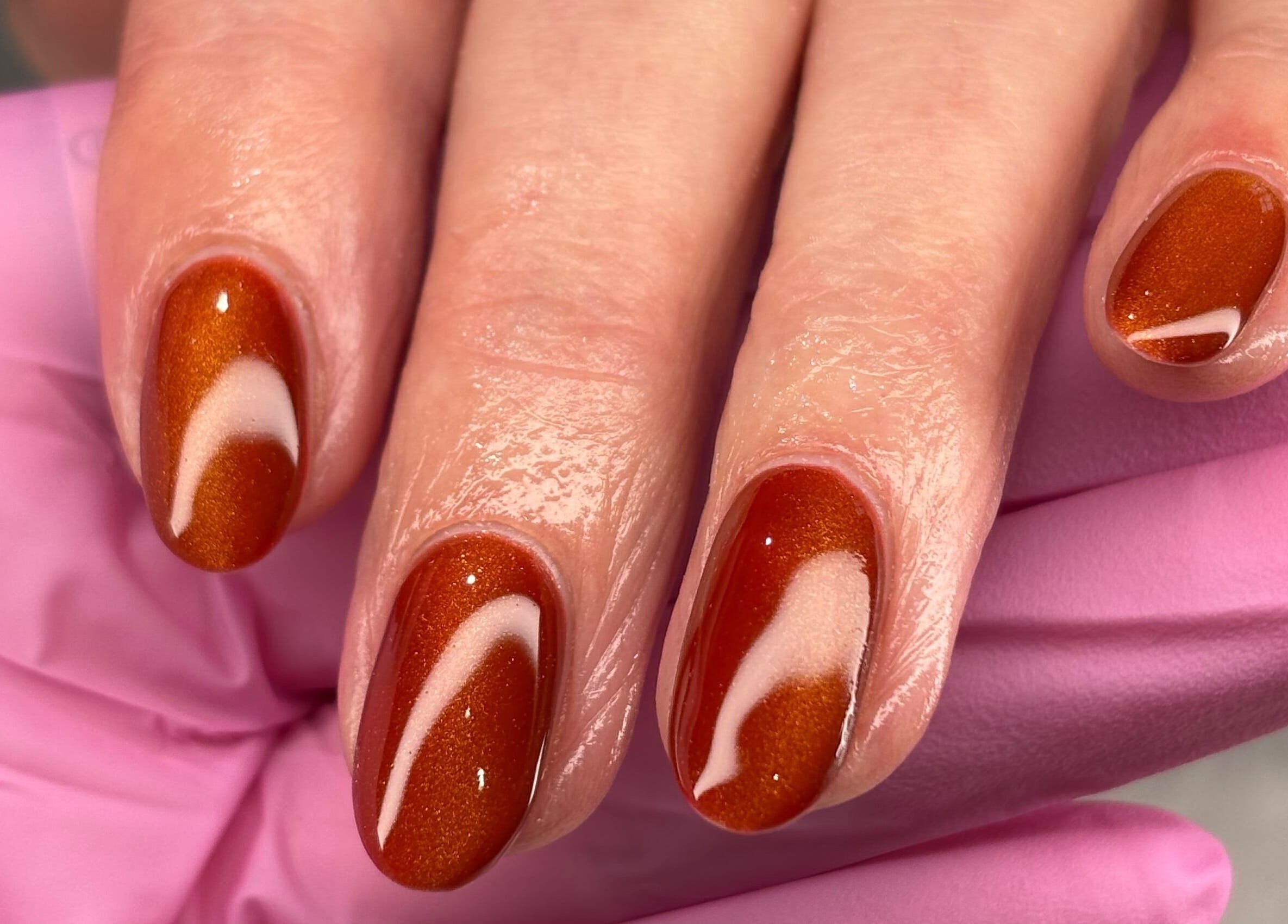 Beautiful autumn-inspired nail art at AmiRoseBeauté, Barrington, England, GB. Perfect for a stylish seasonal look.