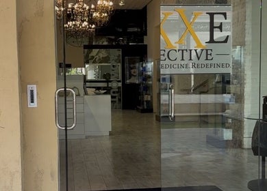 Elegant entrance of Thai massage wellness in Las Vegas, Nevada, US, featuring stylish chandelier lighting.