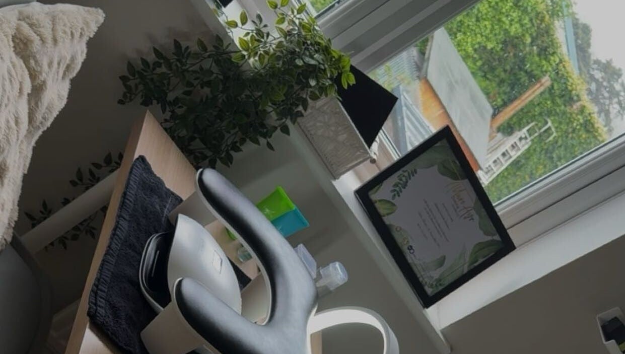 Serene spa treatment room at Mindful Beauty, Lochmaben, Scotland, GB with relaxing decor and cozy ambiance.