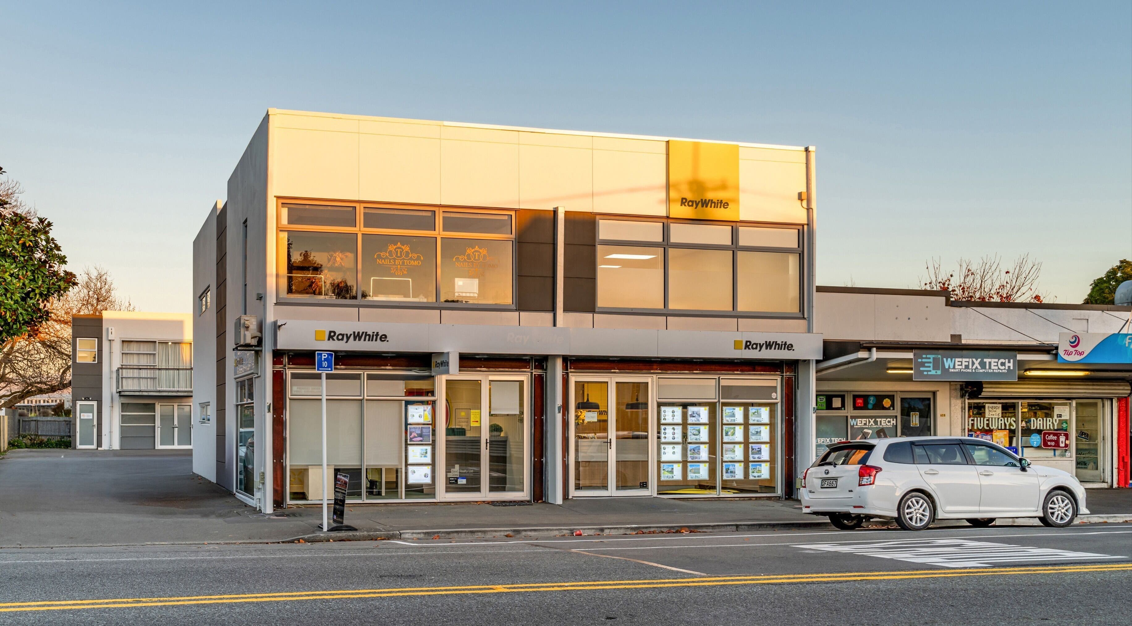 Street view of Nails by Tomo ltd, nestled in Christchurch, Canterbury Region, NZ with a modern exterior facade.