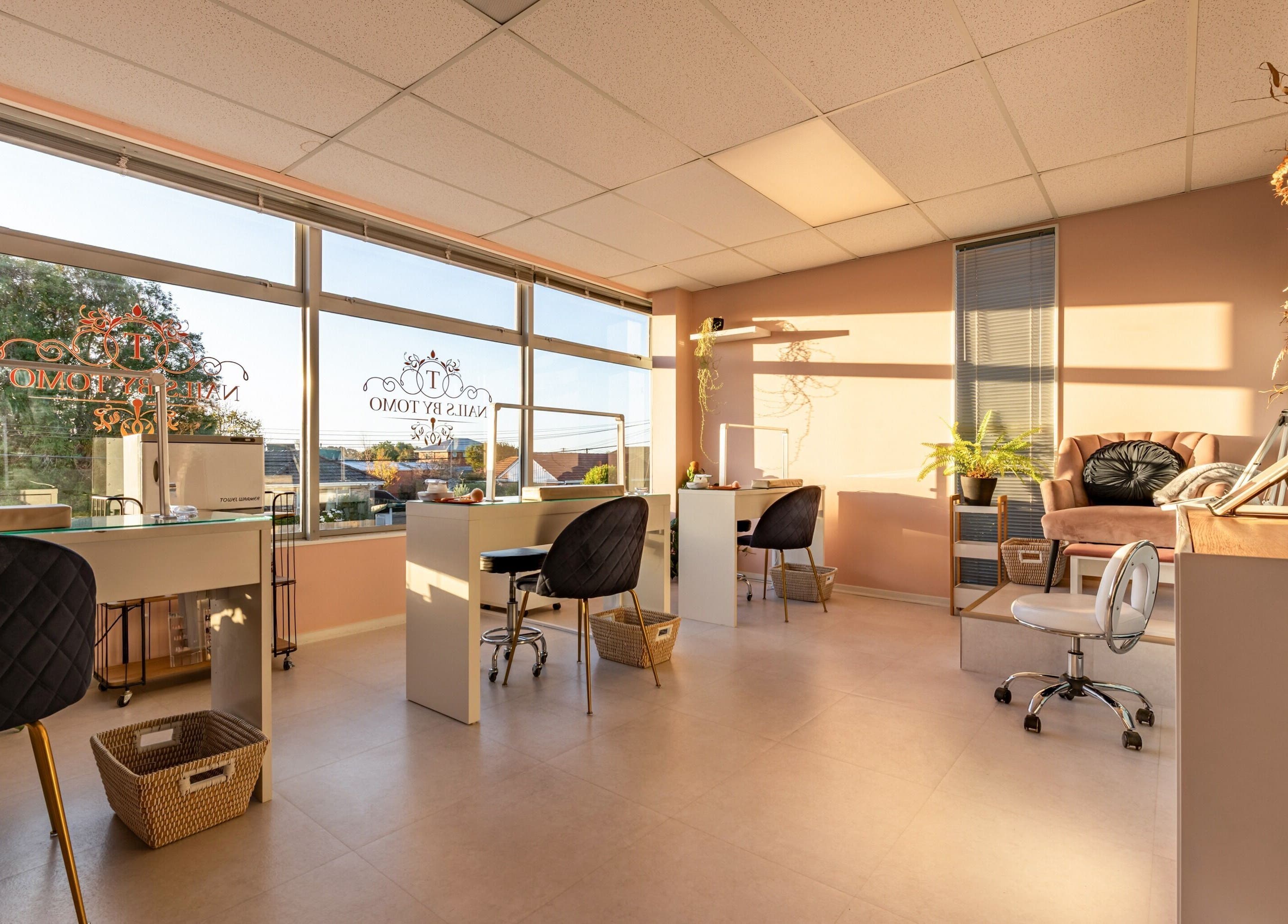 Bright and welcoming interior of Nails by Tomo ltd, Christchurch, Canterbury Region, NZ, perfect for relaxation.