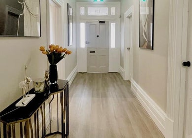 Elegant hallway at The Contour Method in Melbourne, Victoria, AU featuring modern decor and artistic touches.