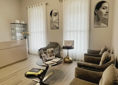 Chic waiting area at The Contour Method, Melbourne, Victoria, AU, featuring plush chairs and modern decor.